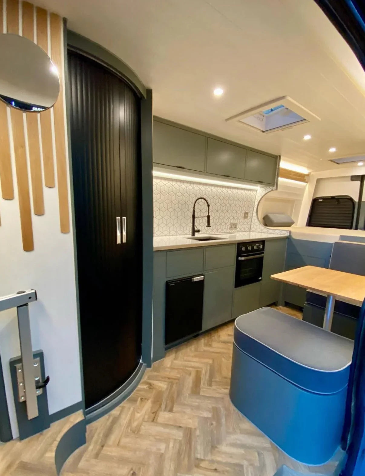 The Benefits of a Space-Saving Shower Door in Your Campervan