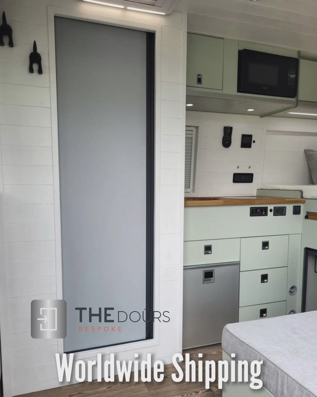 White FOLdoûr Bi Fold Accordion Aluminium Frame Frosted White Acrylic Shower Screen Door Designed for a Campervan