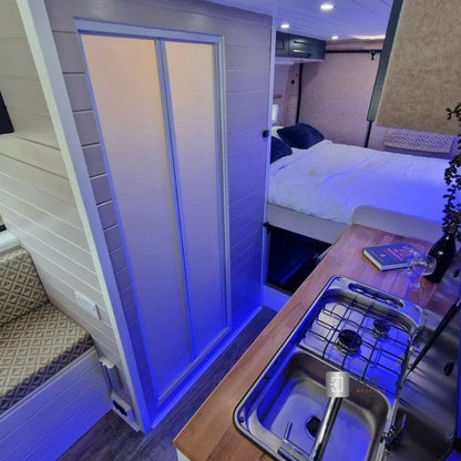 White FOLdoûr Bi Fold Accordion Aluminium Frame Frosted White Acrylic Shower Screen Door Designed for a Campervan