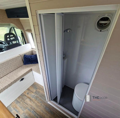 White FOLdoûr Bi Fold Accordion Aluminium Frame Frosted White Acrylic Shower Screen Door Designed for a Campervan